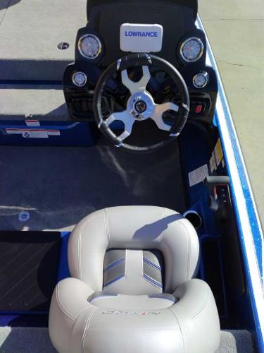 Slide: The Image of 2024 Nitro Z17 boat cockpit with Lowrance electronics and comfortable seating. - 9