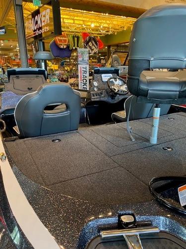 Slide: The Image of 2024 Nitro Z18 boat interior at a showroom. - 4