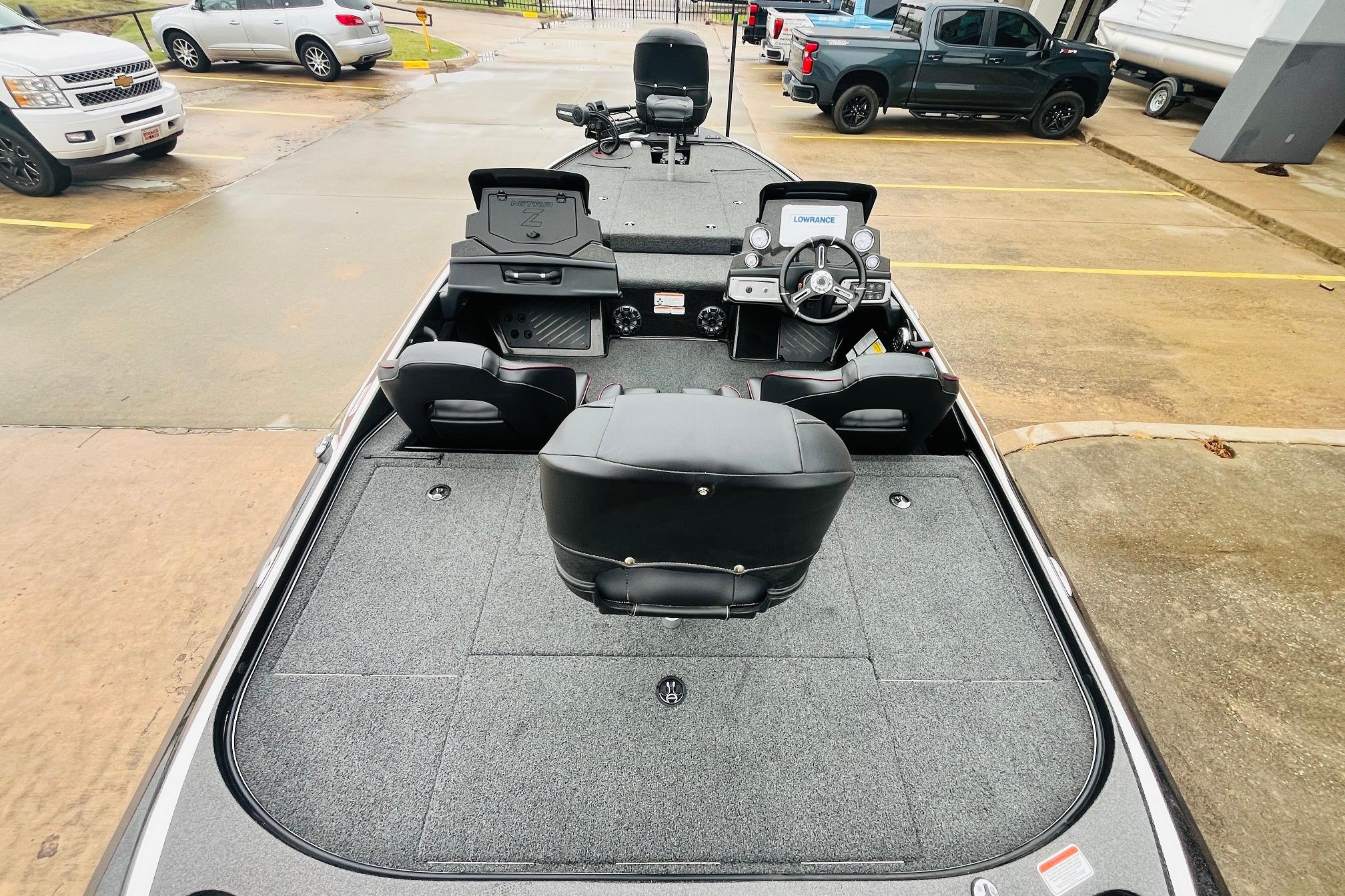 Slide: The Image of 2021 Nitro Z19 Pro boat interior with steering console and seating. - 11