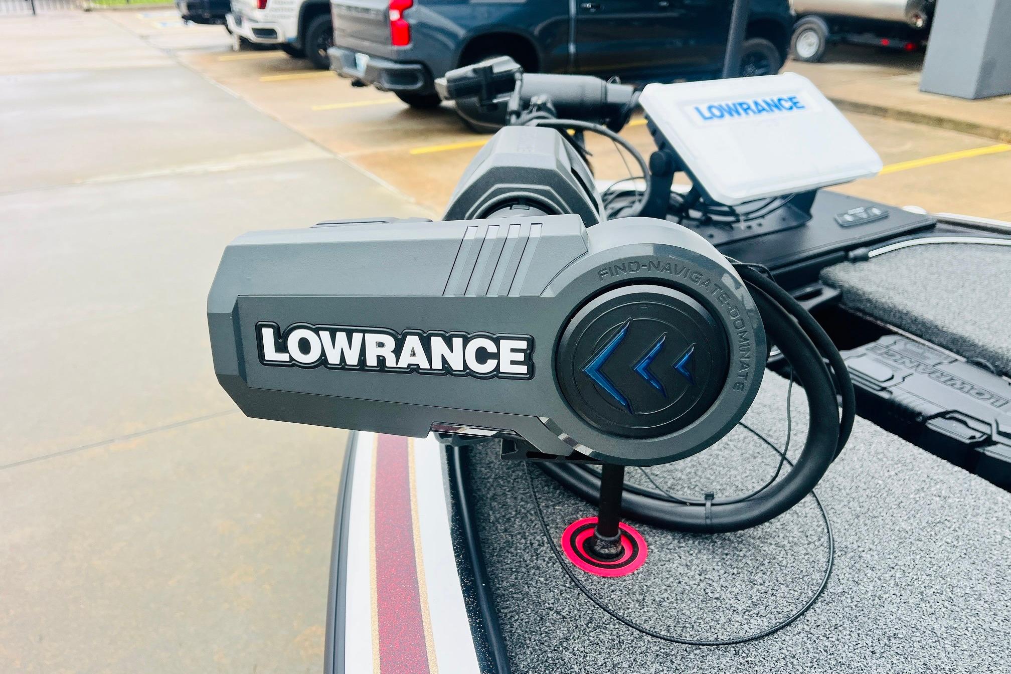 Slide: The Image of Lowrance equipment on a 2021 Nitro Z19 Pro boat, parked in a lot. - 14