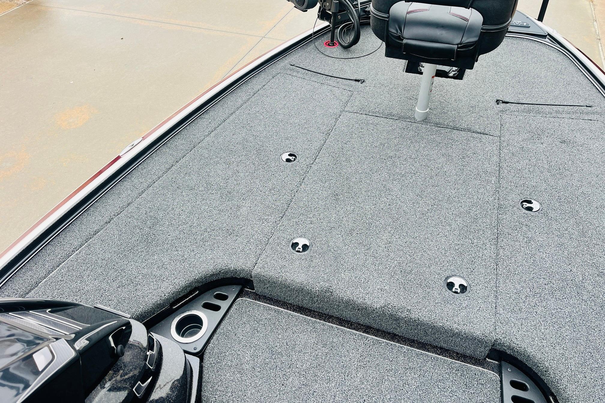 Slide: The Image of 2021 Nitro Z19 Pro boat deck with seating and carpeted surface. - 17