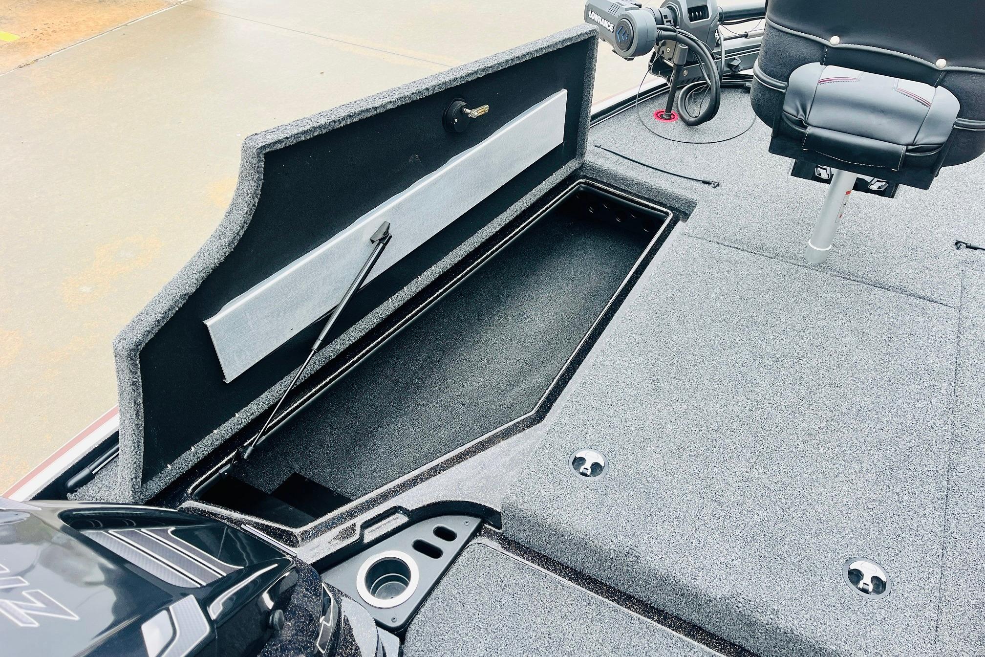 Slide: The Image of Open storage compartment on a 2021 Nitro Z19 Pro boat deck. - 19
