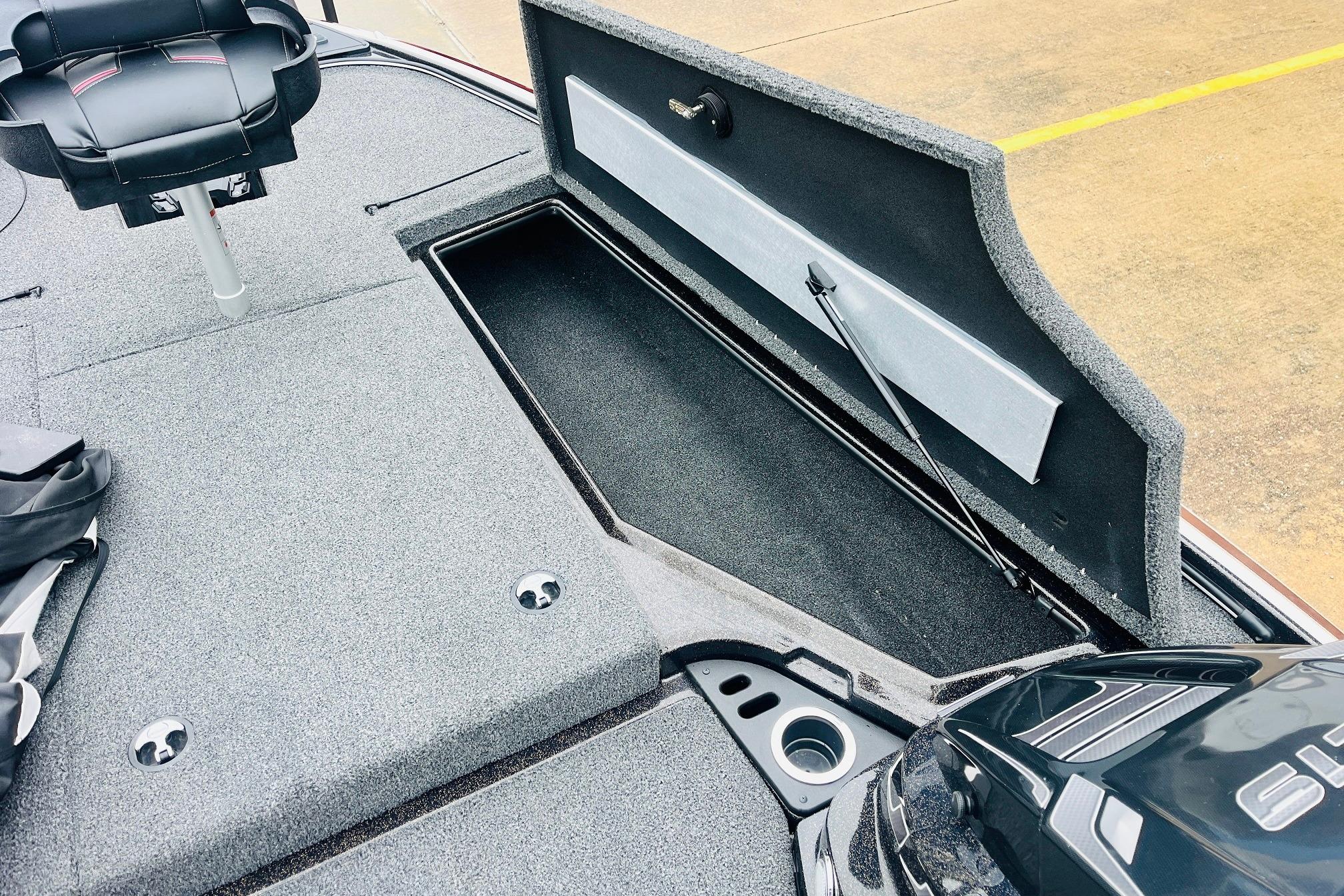 Slide: The Image of 2021 Nitro Z19 Pro boat deck with open storage compartment and seating. - 23