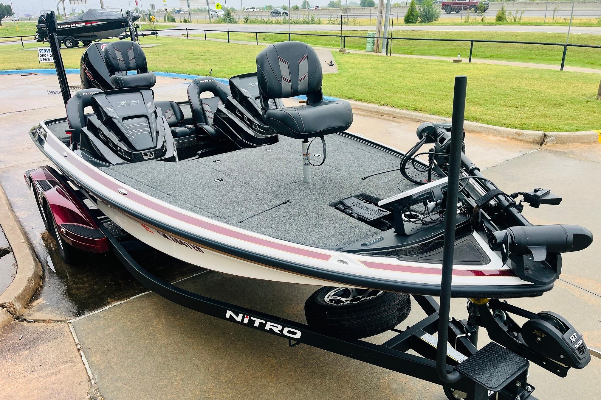 Slide: The Image of 2021 Nitro Z19 Pro fishing boat on trailer, parked outdoors. - 3
