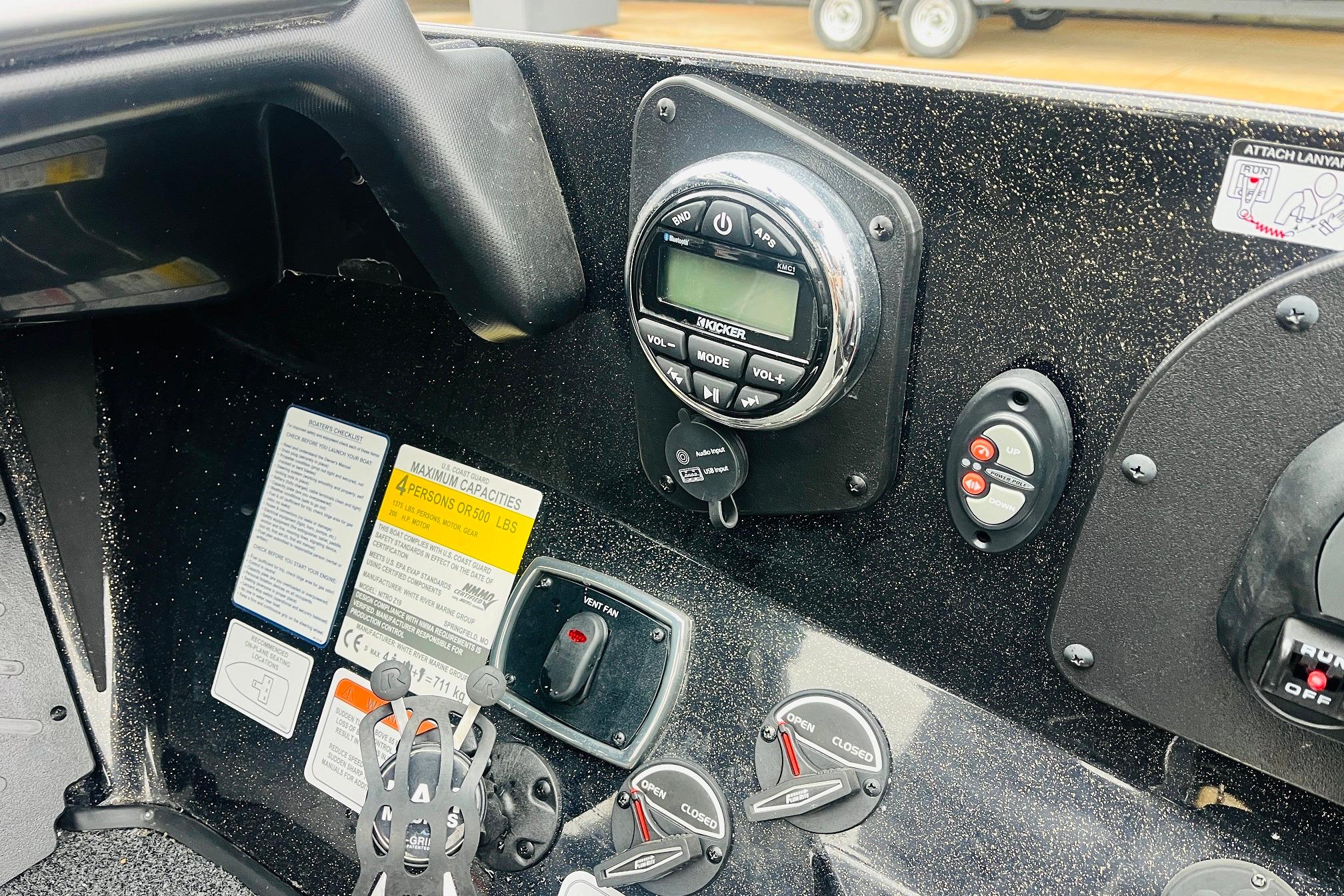 Slide: The Image of Dashboard of a 2021 Nitro Z19 Pro boat with control panel and audio system. - 38