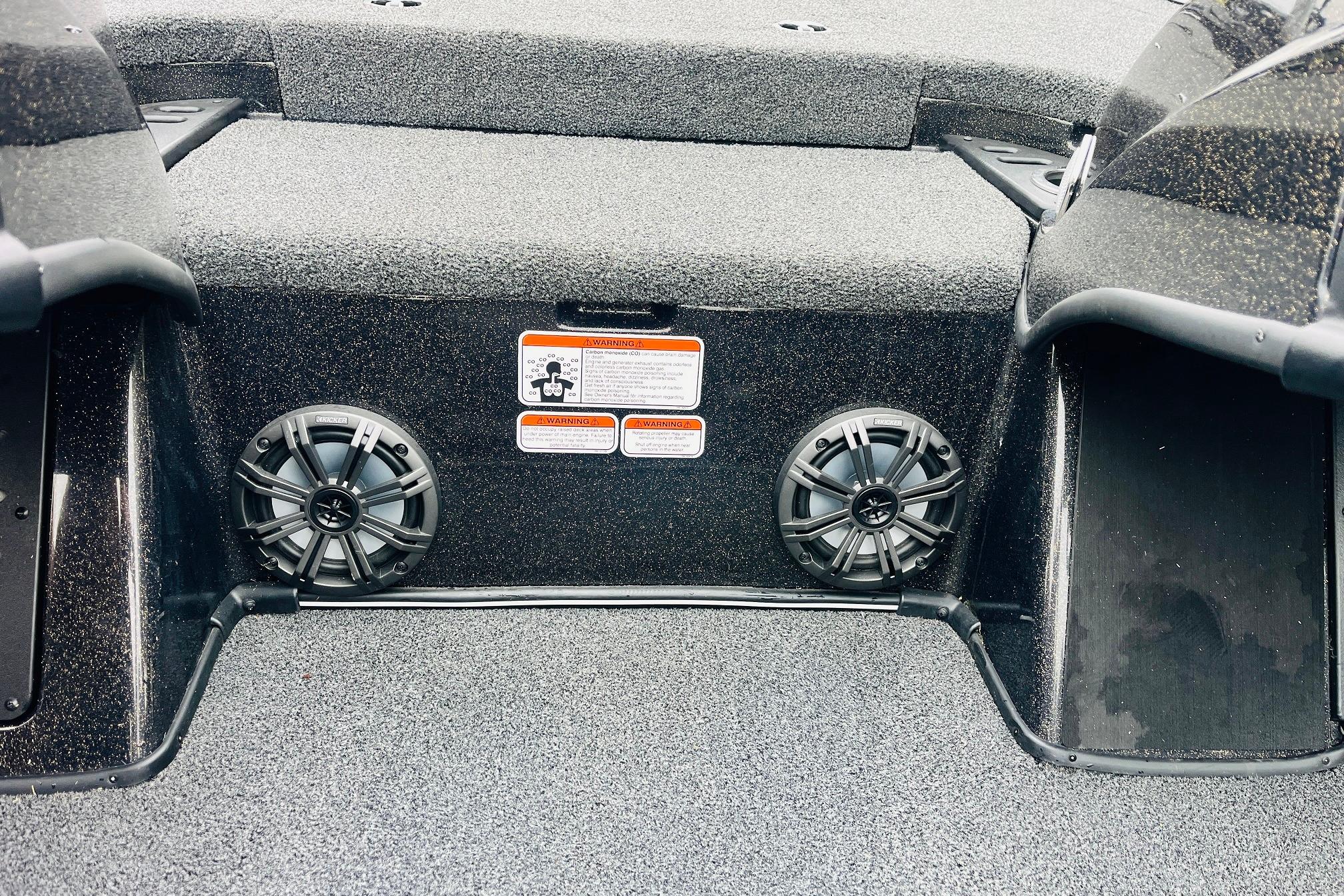 Slide: The Image of 2021 Nitro Z19 Pro boat interior with speakers and warning labels. - 39