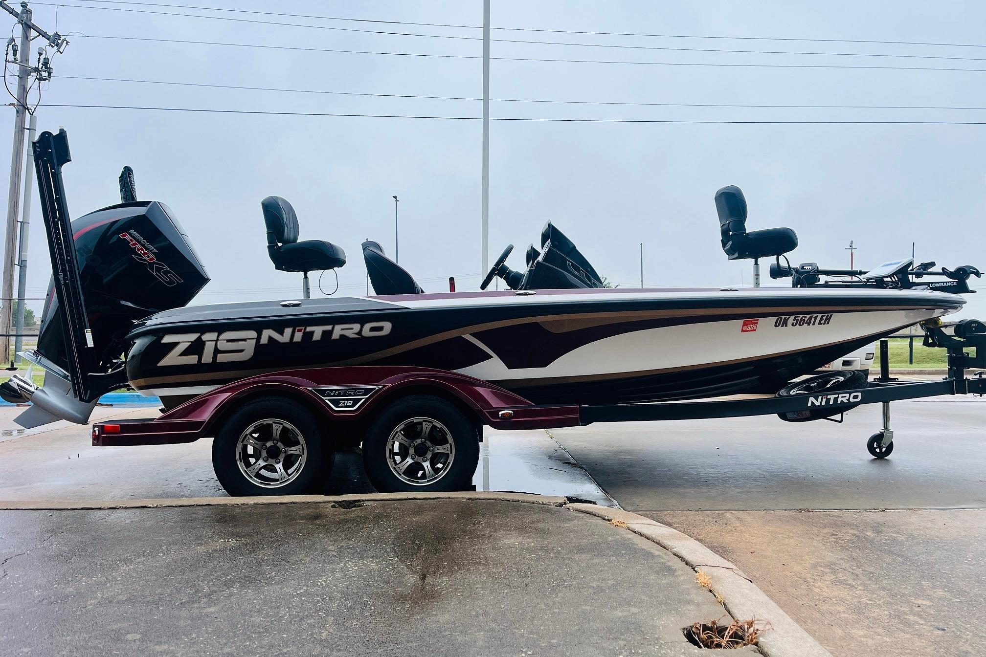 Slide: The Image of 2021 Nitro Z19 Pro boat on trailer, side view, parked outdoors. - 4