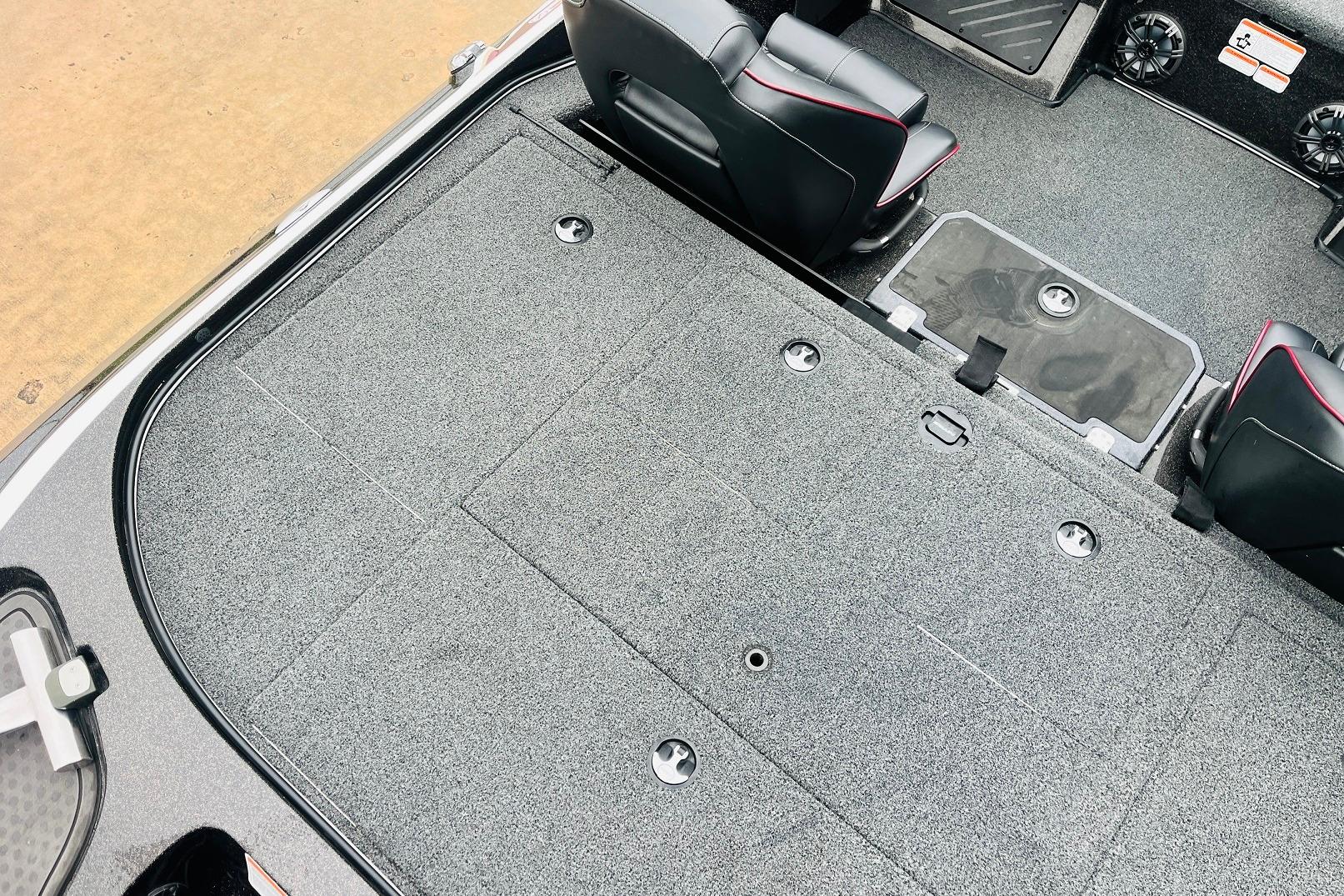 Slide: The Image of Interior view of 2021 Nitro Z19 Pro boat, featuring spacious carpeted deck and seating. - 49