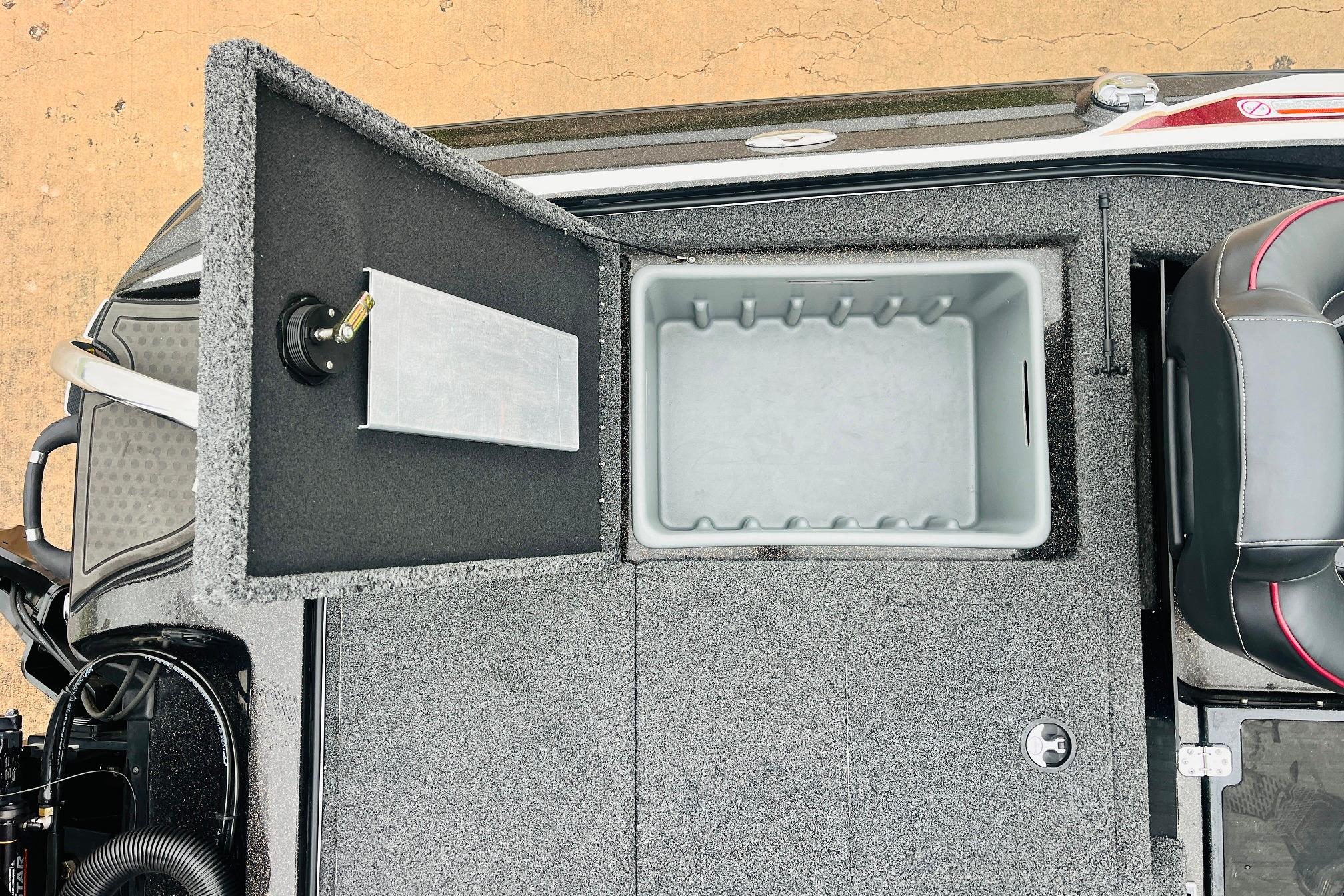 Slide: The Image of 2021 Nitro Z19 Pro boat storage compartment with open lid and seating area. - 51