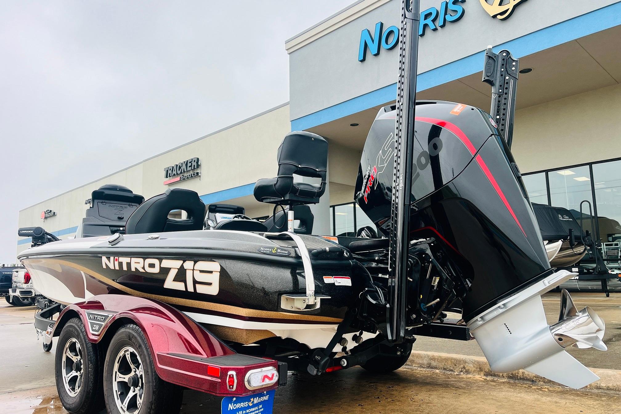 Slide: The Image of 2021 Nitro Z19 Pro boat with powerful engine at dealership. - 8