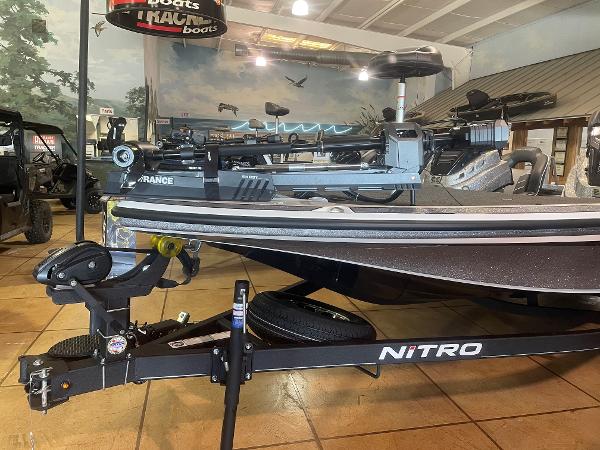 Slide: The Image of 2024 Nitro Z19 Pro boat displayed in showroom with advanced equipment. - 1