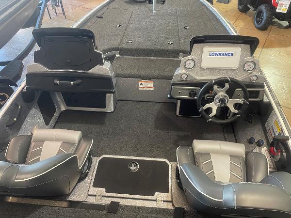 Slide: The Image of 2024 Nitro Z19 Pro boat interior with dual seats and steering console. - 8