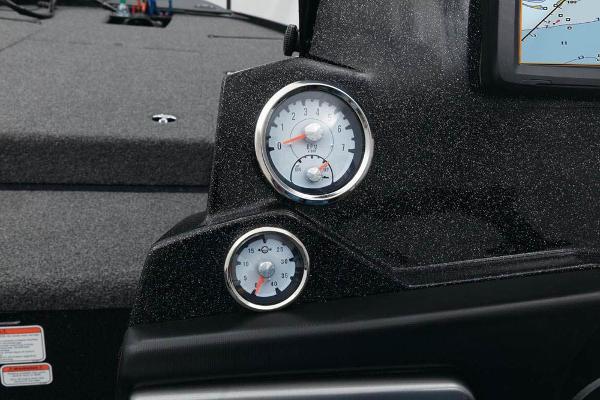Slide: The Image of Close-up of 2022 Nitro Z20 boat dashboard with gauges. - 4