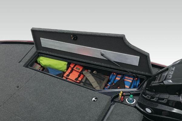 Slide: The Image of Open storage compartment on 2022 Nitro Z20 boat with life jackets and gear. - 9