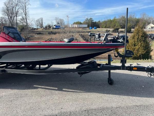 Slide: The Image of 2023 Nitro Z20 Pro boat on a trailer in an outdoor setting. - 2