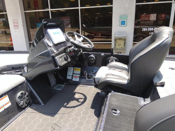 Slide: The Image of 2023 Nitro Z20 Pro boat interior with steering console and seating. - 4
