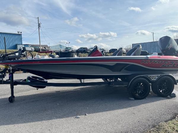 Slide: The Image of 2023 Nitro Z20 Pro bass boat on a trailer, side view. - 6