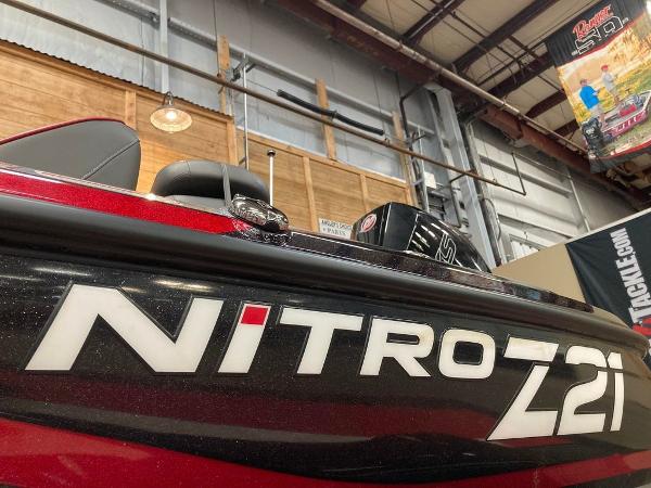 Slide: The Image of 2021 Nitro Z21 Pro boat in a showroom. - 4