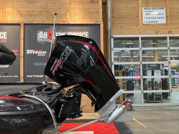 Slide: The Image of 2021 Nitro Z21 Pro boat with Mercury Pro XS engine in showroom. - 5