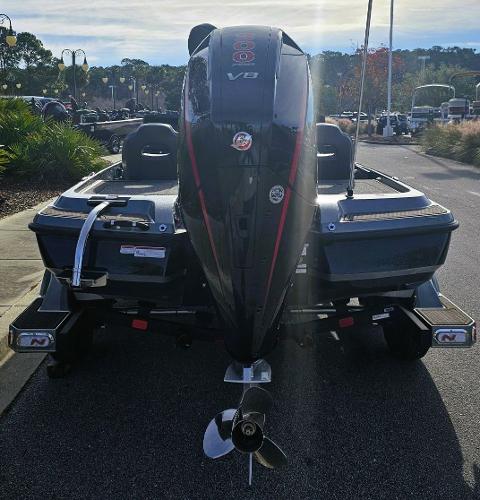 Slide: The Image of 2024 Nitro Z21 XL boat with powerful outboard motor, rear view. - 8