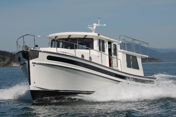 Slide: The Image of 2025 Nordic Tug 40 cruising on open water. - 0