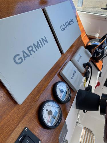 Slide: The Image of NorthCoast 315 HT 2021 boat dashboard with Garmin navigation equipment. - 12