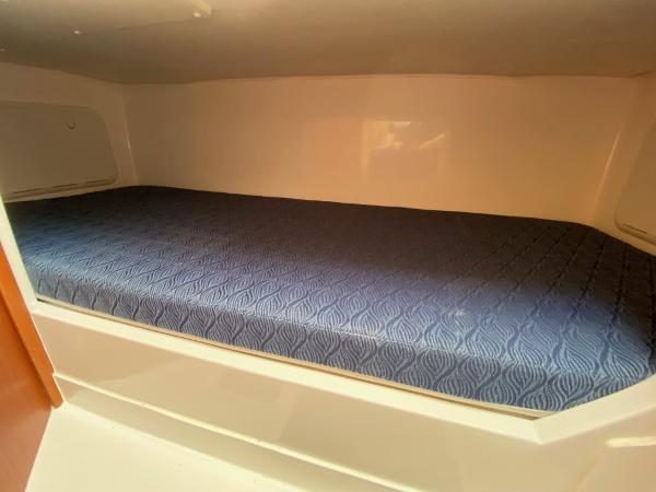 Slide: The Image of 2021 NorthCoast 315 HT boat cabin with blue mattress - 16