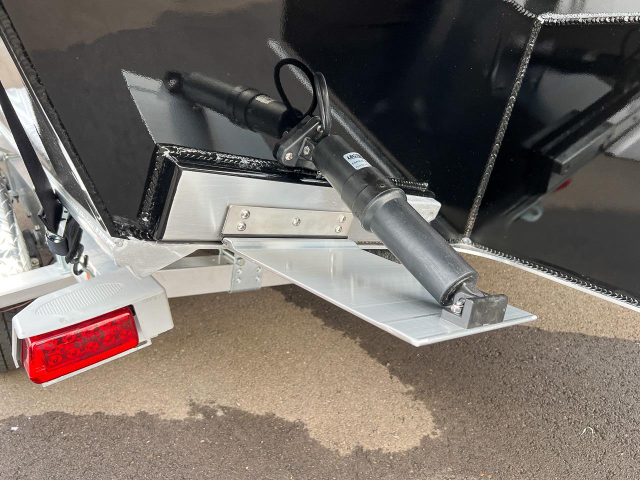 Slide: The Image of Close-up of the 2024 North River 23 SeaHawk boat's trim tab and hydraulic actuator. - 20
