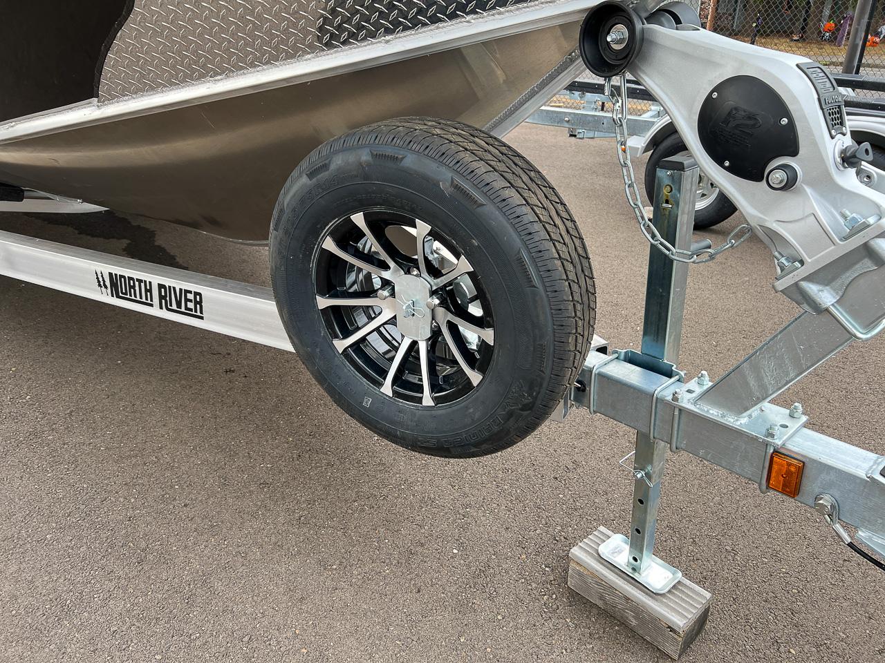Slide: The Image of Close-up of 2024 North River 23 SeaHawk boat trailer with spare tire. - 22