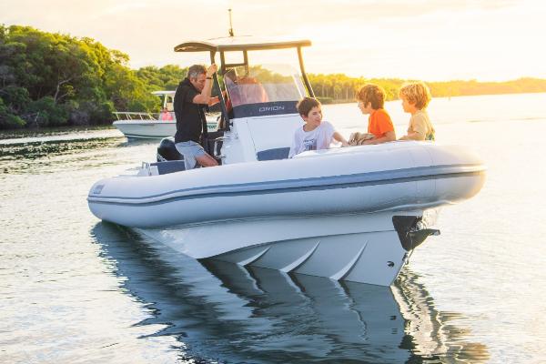 Slide: The Image of 2024 Northstar Orion 8 boat on water with people enjoying a sunny day. - 19