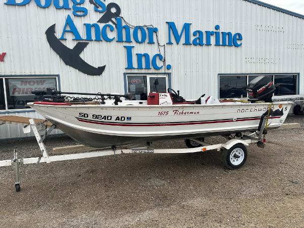 Slide: The Image of 1995 Northwood 1675 Fisherman boat on trailer at Doug's Anchor Marine. - 0