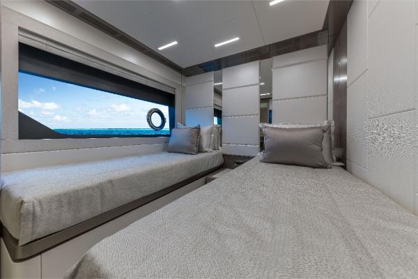 Slide: The Image of 2023 Ocean Alexander 35R yacht cabin with twin beds and ocean view. - 21
