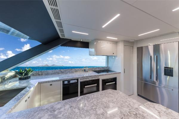 Slide: The Image of Modern kitchen on 2023 Ocean Alexander 35R yacht with ocean view. - 23