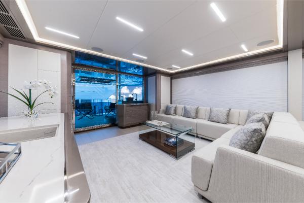 Slide: The Image of Luxurious interior of 2023 Ocean Alexander 35R yacht with modern furnishings and large windows. - 30
