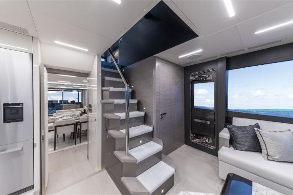 Slide: The Image of Luxurious interior of 2023 Ocean Alexander 35R yacht with modern staircase and ocean view. - 43