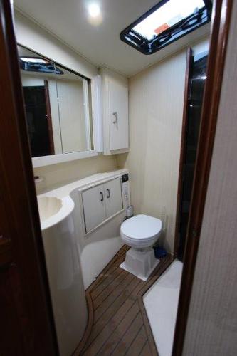 Slide: The Image of Bathroom interior of a 1990 Ocean Yachts 48 Super Sport boat. - 22