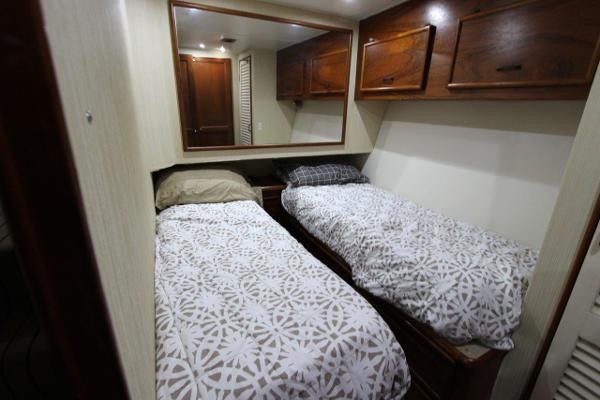 Slide: The Image of Twin bed cabin in 1990 Ocean Yachts 48 Super Sport. - 23