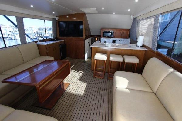 Slide: The Image of Luxurious interior of a 1990 Ocean Yachts 48 Super Sport with modern amenities. - 7