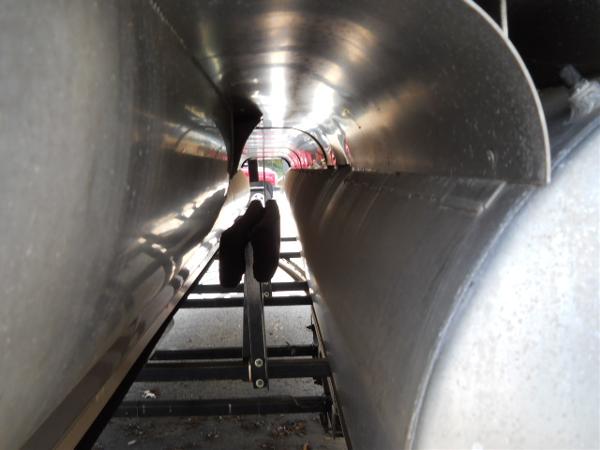 Slide: The Image of Close-up view of the underside of a 2004 Odyssey Millennium 2502M boat. - 17