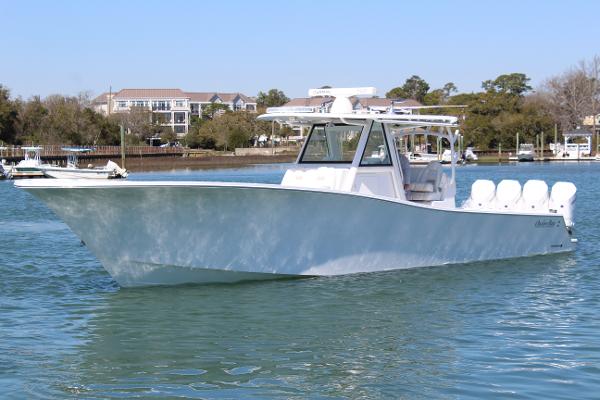 Slide: The Image of 2021 Onslow Bay 41 Tournament Edition boat on water. - 0