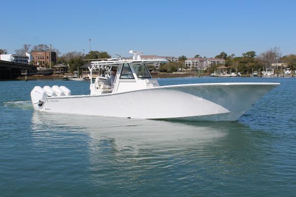 Slide: The Image of 2021 Onslow Bay 41 Tournament Edition boat on water. - 14