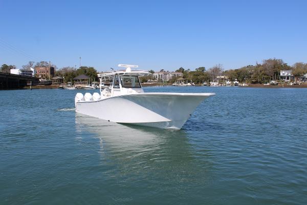 Slide: The Image of 2021 Onslow Bay 41 Tournament Edition boat on the water. - 15