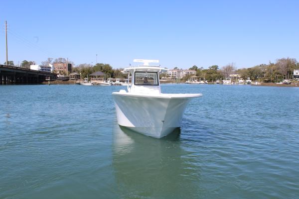 Slide: The Image of 2021 Onslow Bay 41 Tournament Edition boat on calm water. - 16