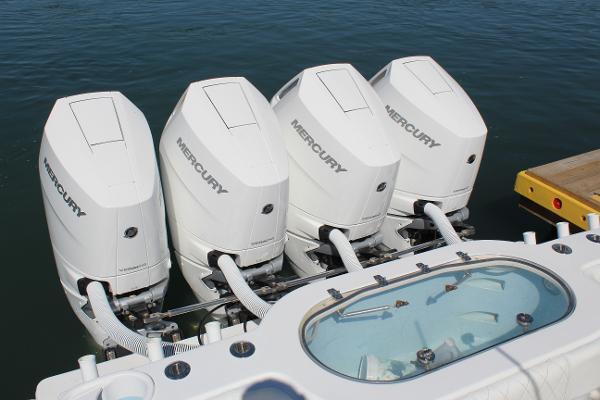 Slide: The Image of 2021 Onslow Bay 41 Tournament Edition with four Mercury outboard engines. - 17