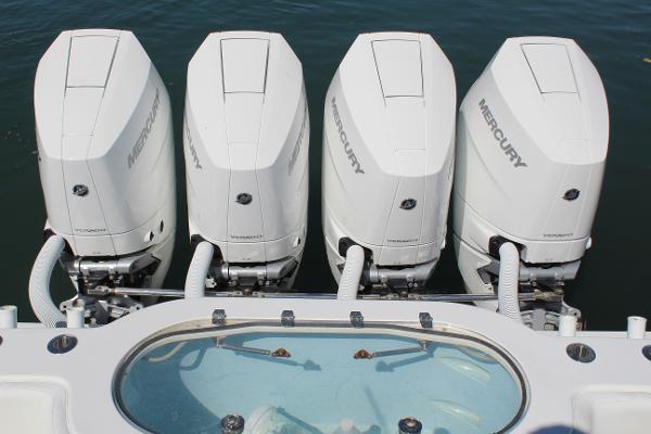 Slide: The Image of 2021 Onslow Bay 41 Tournament Edition with four Mercury outboard engines. - 18