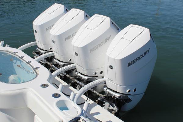 Slide: The Image of 2021 Onslow Bay 41 Tournament Edition with four Mercury outboard engines. - 19