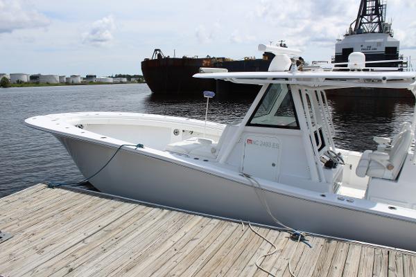 Slide: The Image of 2021 Onslow Bay 41 Tournament Edition boat docked at a marina. - 22