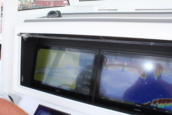 Slide: The Image of 2021 Onslow Bay 41 Tournament Edition boat with Garmin navigation screens. - 25