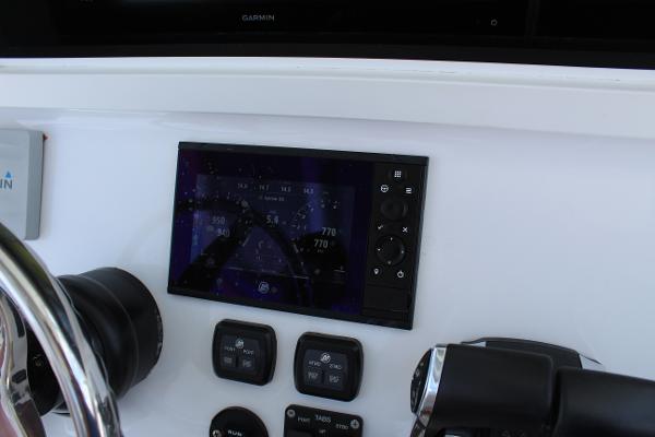 Slide: The Image of 2021 Onslow Bay 41 Tournament Edition helm with Garmin navigation display. - 26