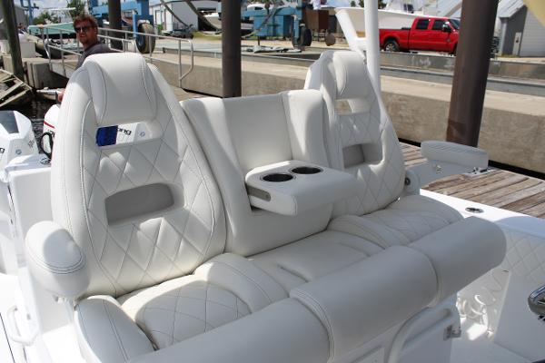 Slide: The Image of 2021 Onslow Bay 41 Tournament Edition boat with luxurious white leather seating. - 31